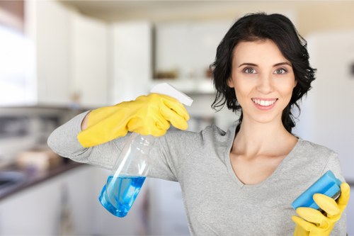 Professional carpet cleaners assessing a service complaint outcome