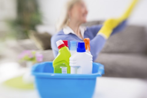 Protected carpet cleaning operative using PPE in a Whitton property
